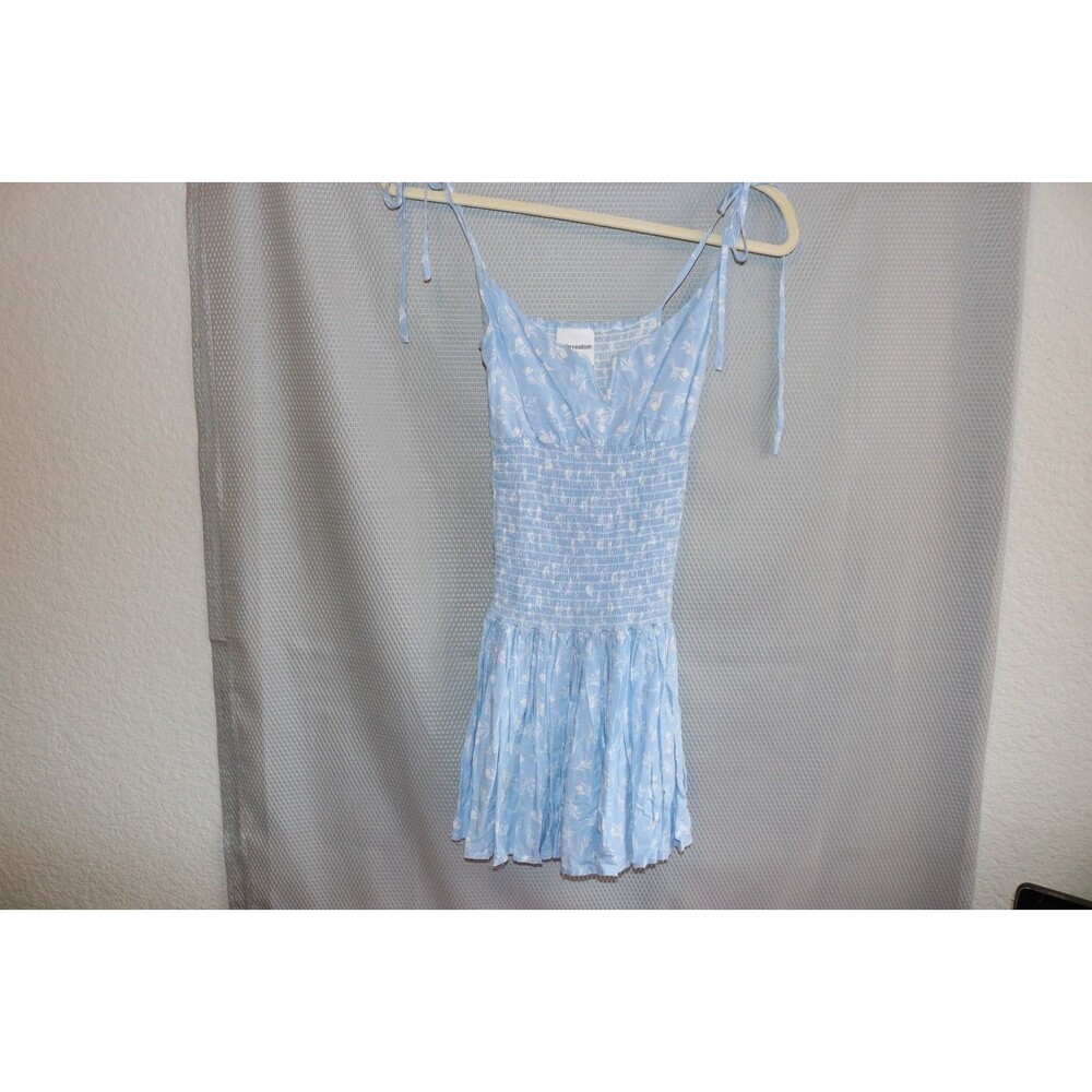 Skylar + Madison | Floral Ruffle Drop Waist Cami Mini Dress Vibrant Blue Dress
